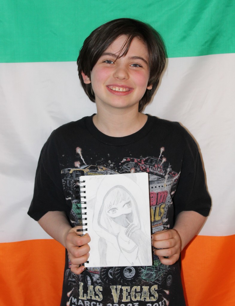 Riley Sanders (10) with her award-winning sketch book